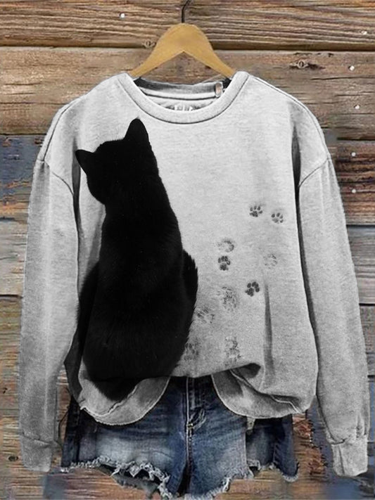 Black Cat & Paw Prints In The Snow Sweatshirt